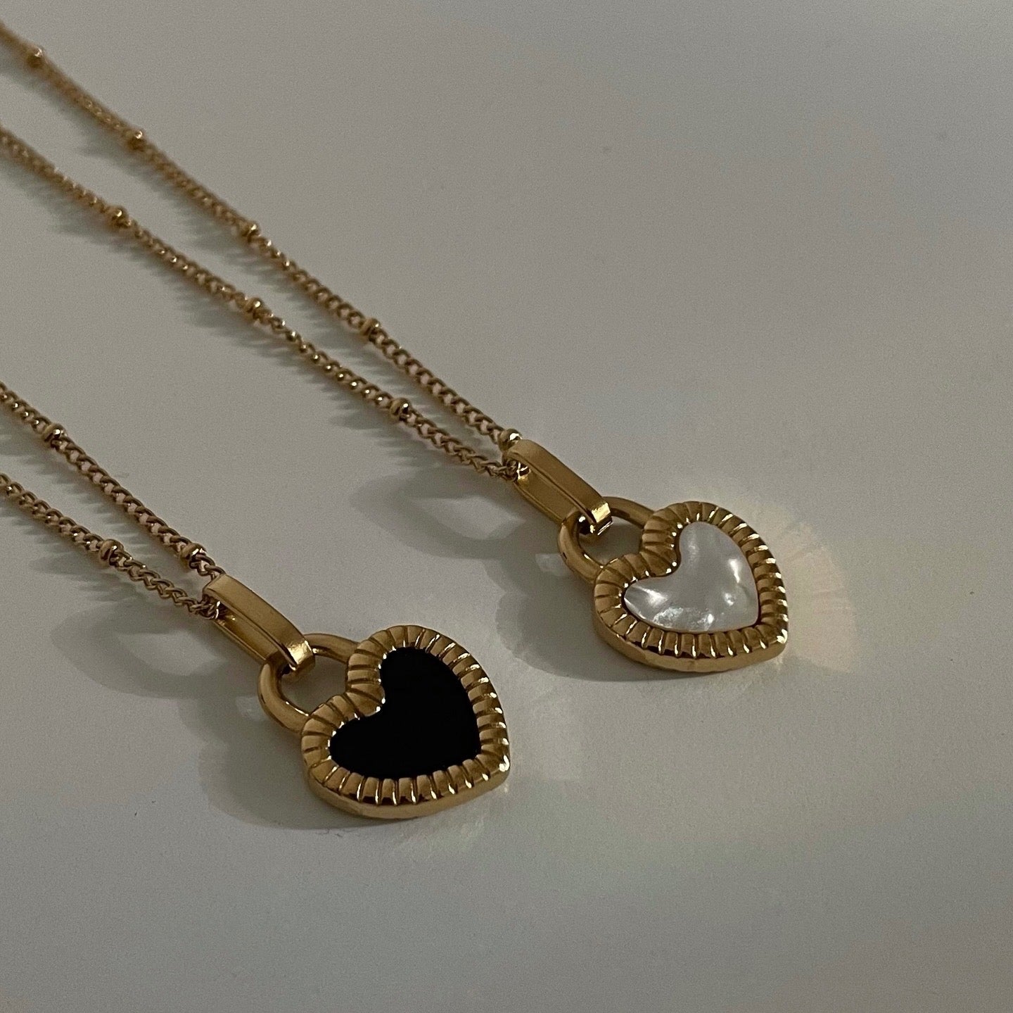 Collar Corazón negro doble vista